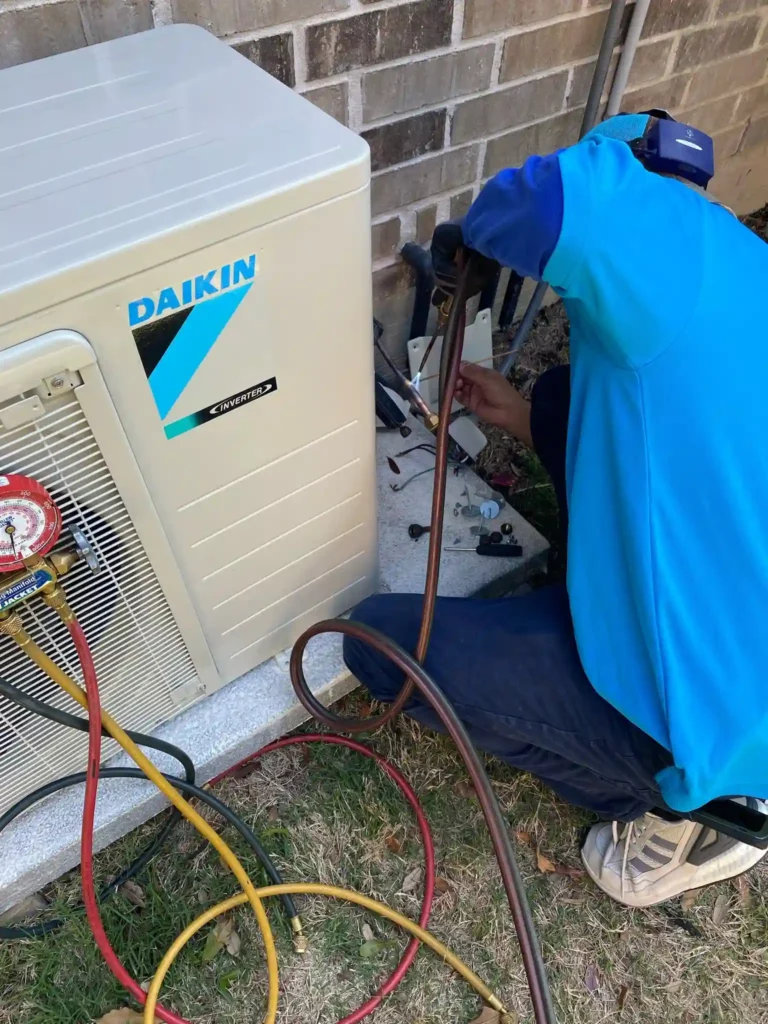 24sevenac workmen make repairs for Ductless Air Conditioning in Houston