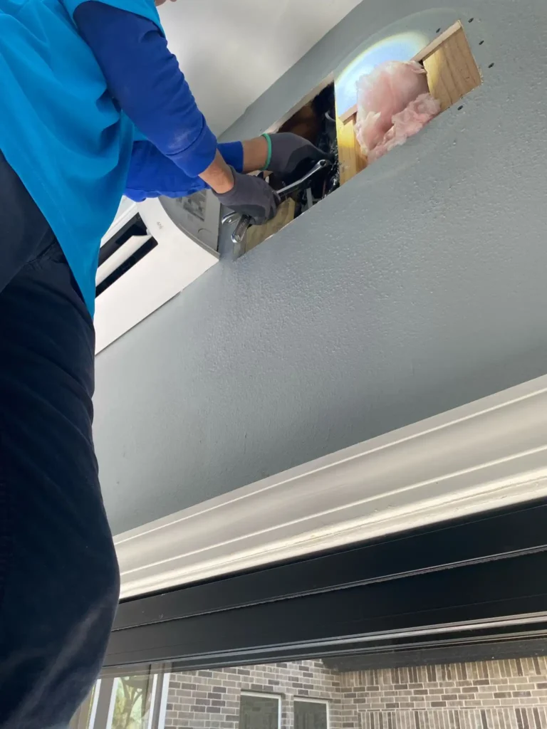 24sevenac workmen make repairs for Ductless Air Conditioning in Houston